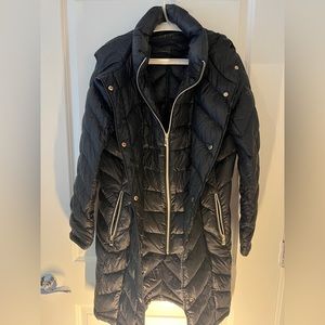 Double closure from zipper and buttons , gold hardware, hooded black puff coat!